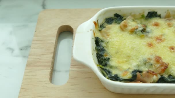 Spinach lasagna in plate on cutting board — Stock Video