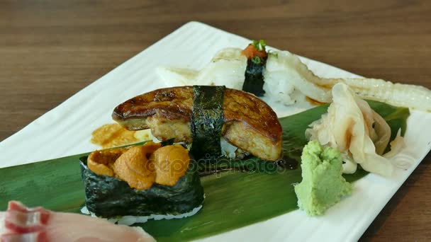 Sushi set on white table — Stock Video