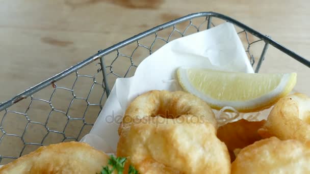 Calamari rings with lemon — Stock Video