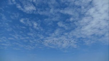 white clouds moving on blue sky