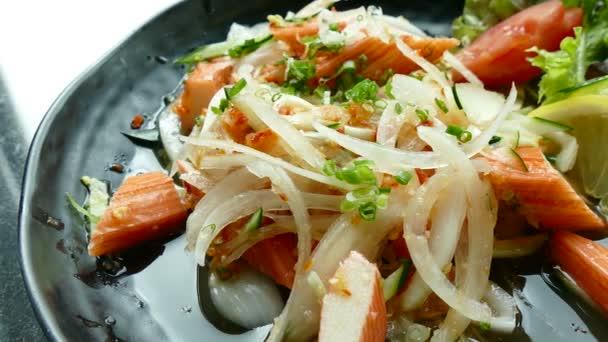 Salad with crab sticks and lemon — Stock Video