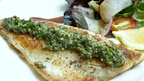 Sea bass steak with sauce — Stock Video