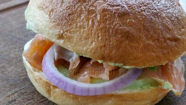 Delicious Smoked Salmon Bagel Wooden Table — Stock Video