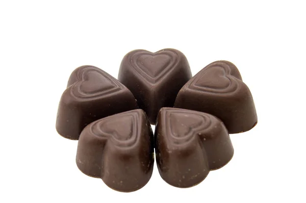 Schokoladenbonbons isoliert auf weißem Hintergrund. — Stockfoto