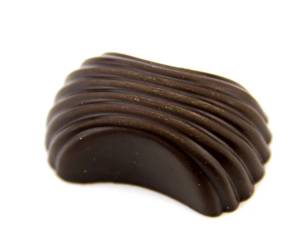 Caramelle al cioccolato isolate su sfondo bianco. — Foto Stock