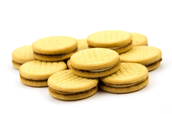 Galletas de pan corto sobre un fondo blanco —  Fotos de Stock