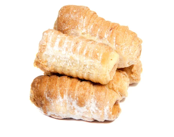 beyaz zemin üzerine krema ile rulo.