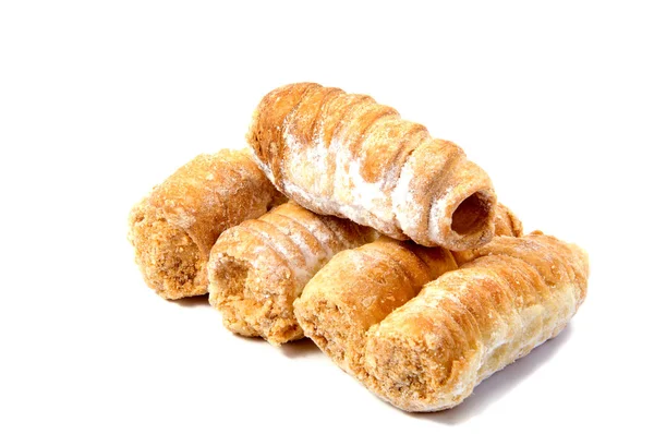 Rolls with cream on a white background. — Stock Photo, Image