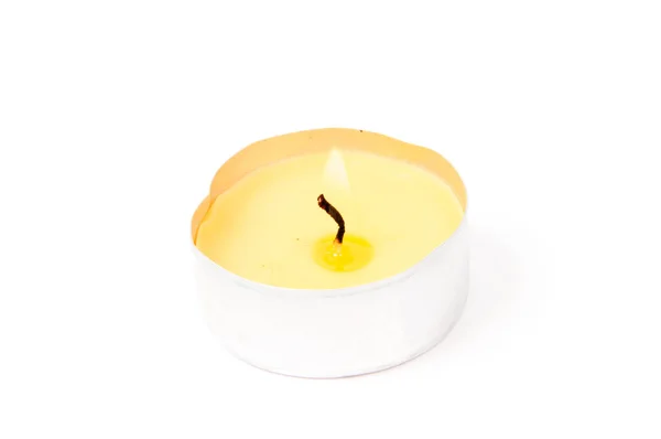 A burning candle isolated on white background with light shaddow and reflection — Stock Photo, Image