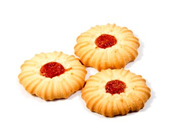 Beyaz arkaplanda küçük bisküviler