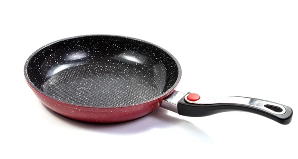 Вид сбоку красной сковороды с антипригарной поверхностью — стоковое фото