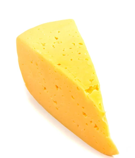 白色背景抠出一个孤立的奶酪块 — 图库照片
