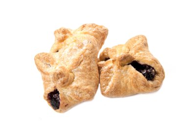 Beyaz arkaplanda küçük bisküviler . 