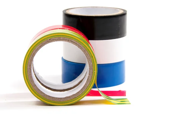 Closeup of multicolored insulating tapes isolated on white background — Stock Photo, Image