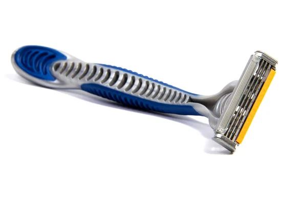 Use disposable shaving machine on white background — Stock Photo, Image