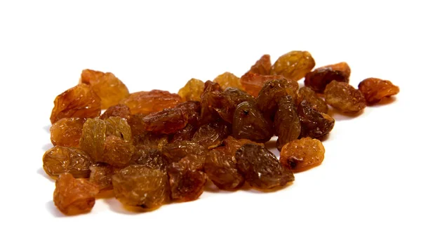 Pasas de sultanas amarillas aisladas sobre fondo blanco recorte — Foto de Stock