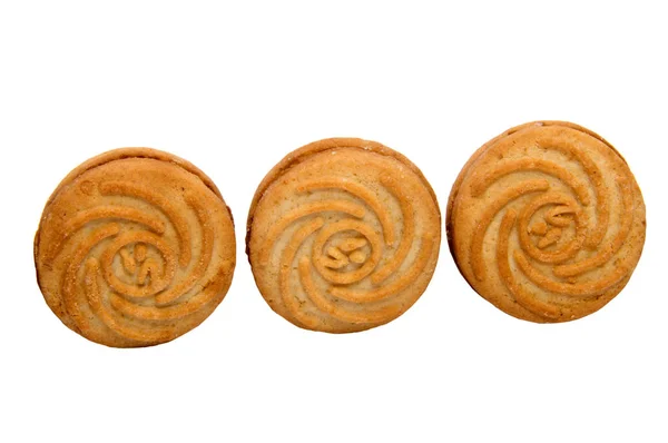 Galletas de pastelería cortas apiladas aisladas en blanco — Foto de Stock