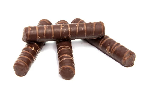 Rouleaux de plaquettes avec chocolat isolé sur blanc — Photo