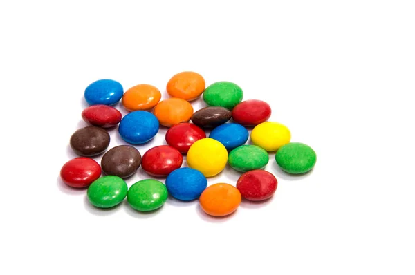 Farbe Bonbons auf einem Tischhintergrund aus Farbe — Stockfoto