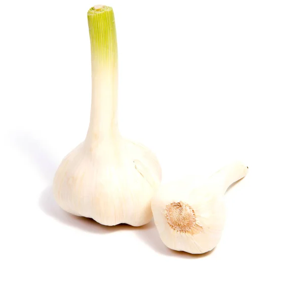 Fresh organic garlic and cutted garlic clove isolated on white — Stock Photo, Image