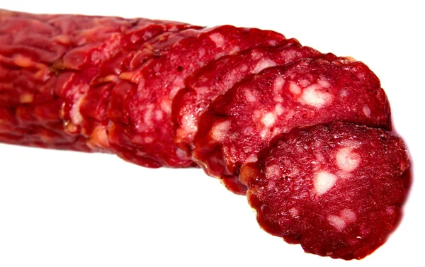 Gerookte salami worst segmenten geïsoleerd op wit — Stockfoto