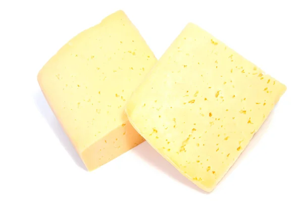 ホワイト バック グラウンド素材に分離されたチーズ ブロック. — ストック写真