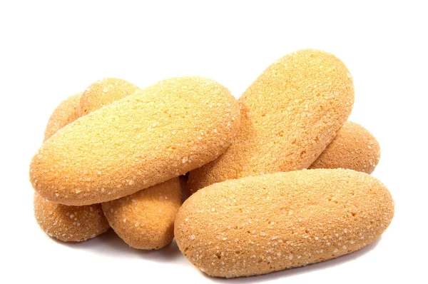 Beyaz arkaplanda küçük bisküviler . .