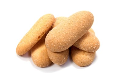 Beyaz arkaplanda küçük bisküviler . .