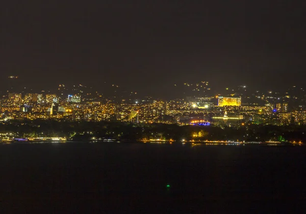 Lumières de nuit paysage urbain — Photo