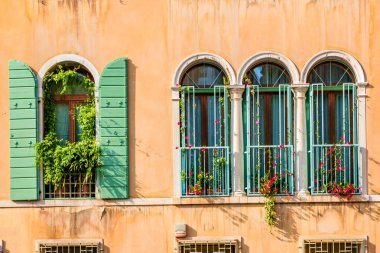 Facade of old house in Venice, Italy
