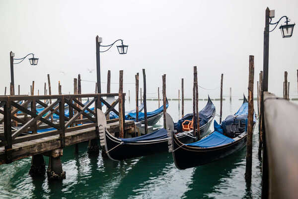 Mystical foggy early morning in Venice, Italy