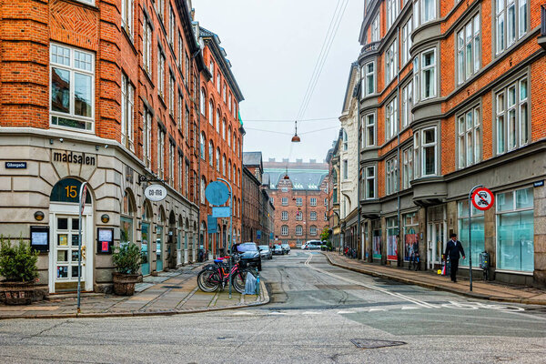 Copenhagen, Denmark - May, 2019: Street life in Copenhagen. Morning in the city center.