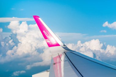 Lviv, Ukraine - May, 2019: Wizzair logo on the wing of plane, view from the plane.