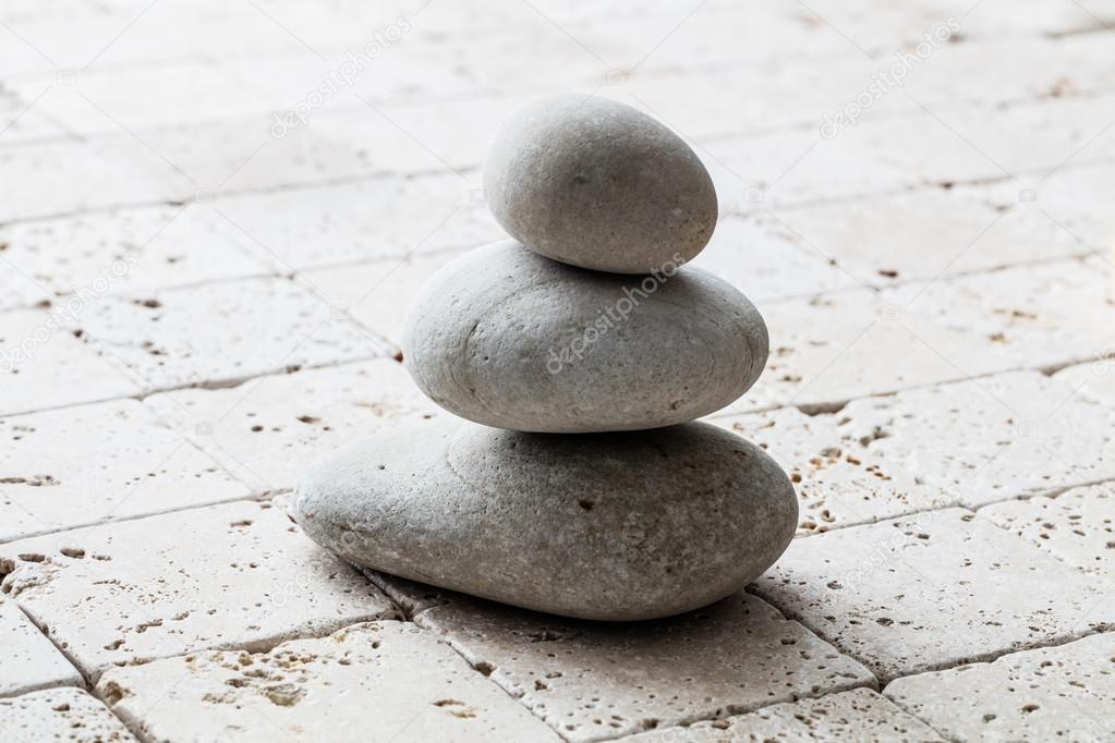 symbol of mindfulness, balance and meditation over limestone, copy space