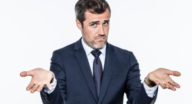 young bearded manager accusing or reproaching leadership for being coward