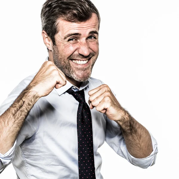 Smiling hairy businessman showing fists for punchy corporate fight — Stock Photo, Image