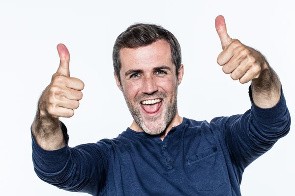 Dynamic handsome young man with thumbs up laughing, showing joy — Stockfoto