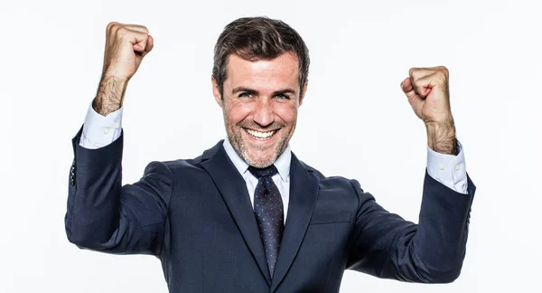 Satisfied young businessman with elegant suit and tie for success — Stock Photo, Image