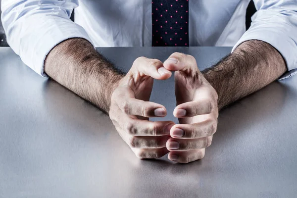 tensed corporate hands expressing annoyance, stress, nervousness or embarrassment