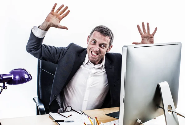 Upset businessman having a corporate tantrum at his computer desk — Stock Photo, Image