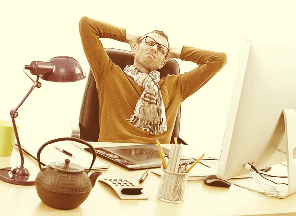 Exhausted entrepreneur with headache suffering from working late, vintage effects — Stock Photo, Image