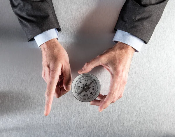 Businessman hands showing the corporate direction or way forward — Stock Photo, Image