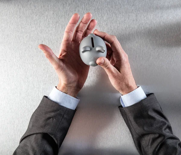 Caring businessman hands holding a safe money box, flat lay — Stock Photo, Image