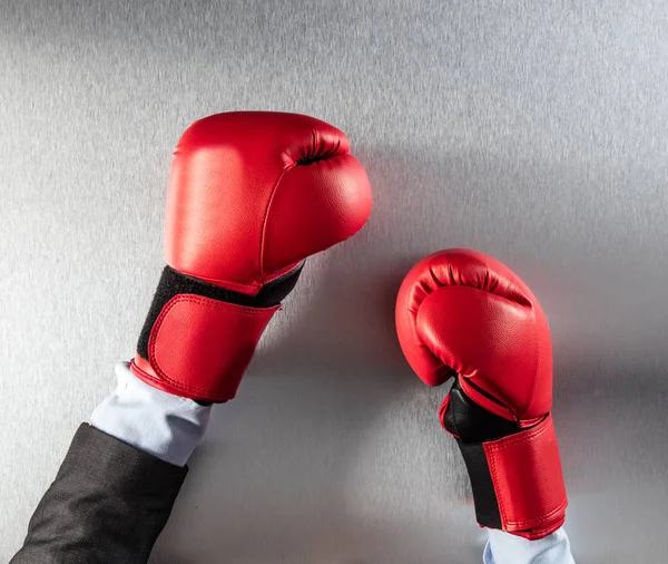 concept of frustration or office competition for boxing businessman