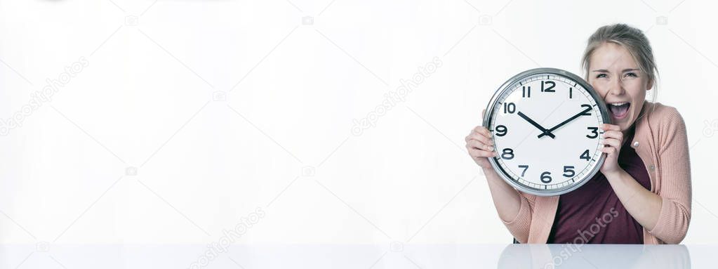 ecstatic beautiful blond girl holding time concept, long white banner
