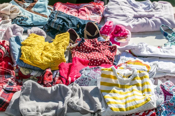 second hand baby and children clothes for reusing or reselling