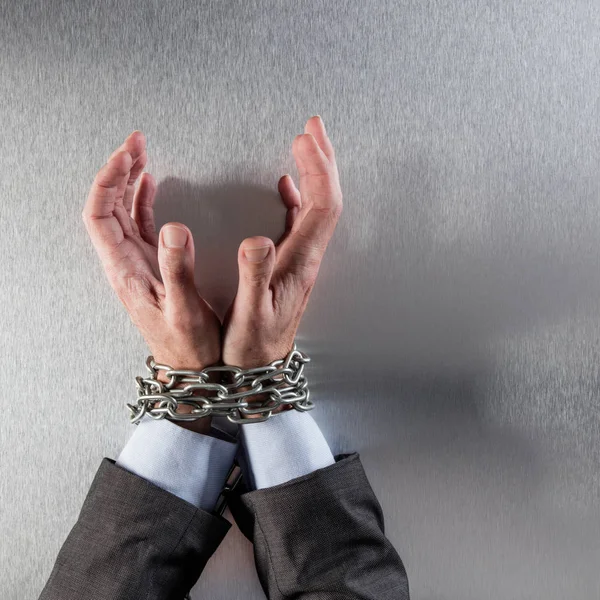 Pleading businessman hands tied begging for concept of suspicious management — Stock Photo, Image