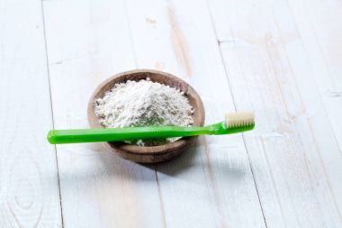 Green healthy dental care and hygiene with homemade baking soda clipart