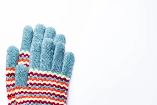Colored knitted gloves on white background — Stock Photo, Image