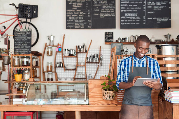 African entrepreneur wearing apron